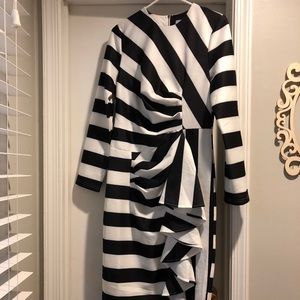 Classic white and black dress with ruffle